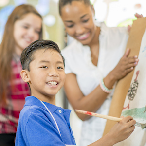 iStock-Students_Showing_His_Painting-block.jpeg